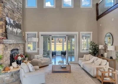 Luxury lodge living room with stone fireplace
