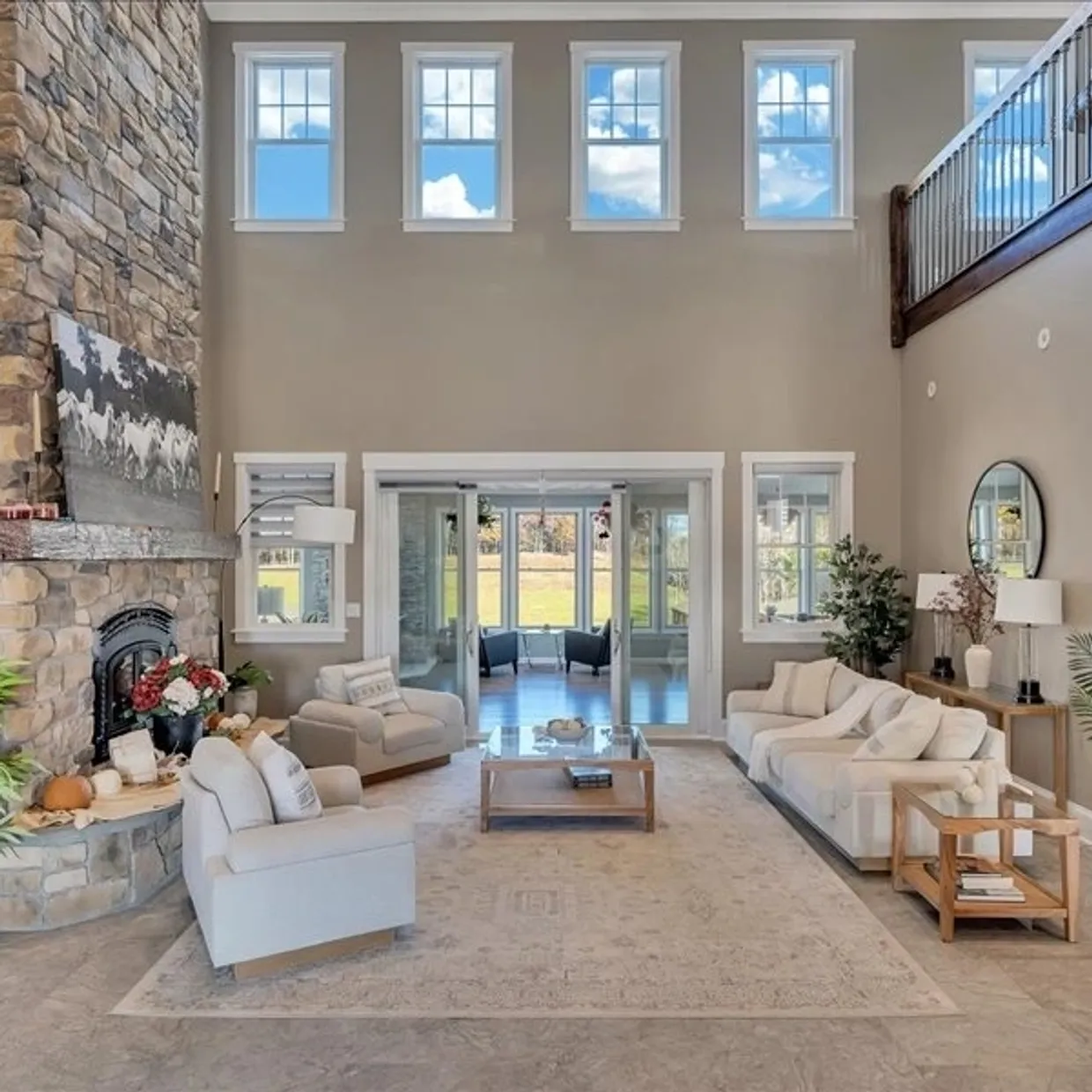 Luxury lodge living room with stone fireplace